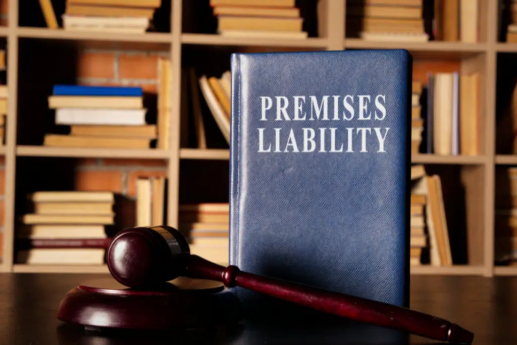 premises liability book and a gavel in a library