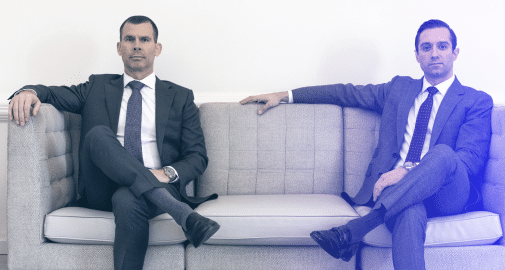 Atornneys Keith Vona and John Richomd in a sitting pose