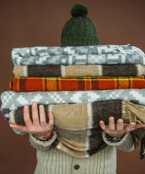 Person carrying warm clothing