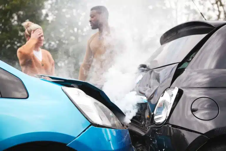 Two angry motorists arguing over responsibility after an accident