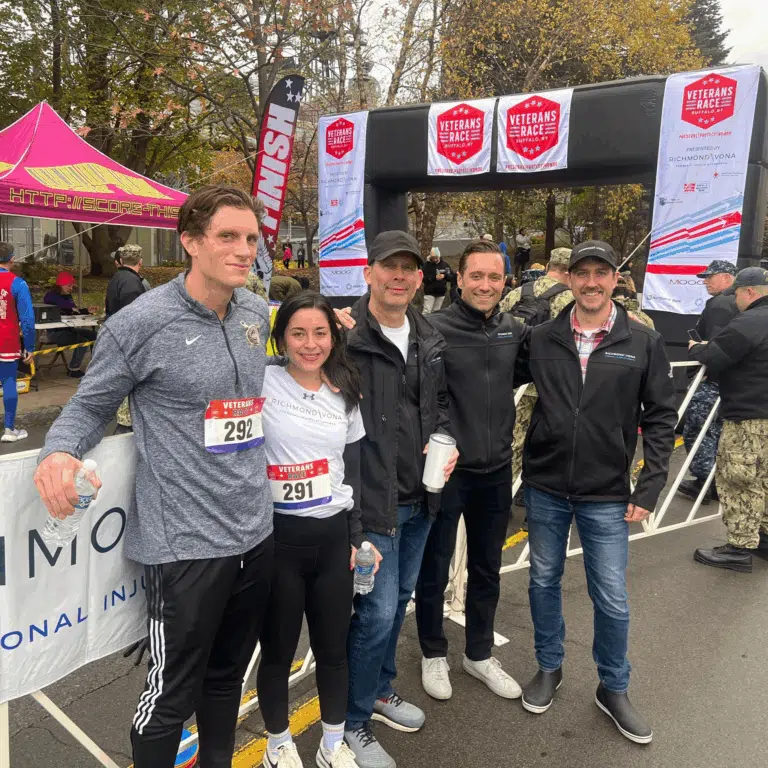 Group participants posing together at a Richmond Vona community outreach event