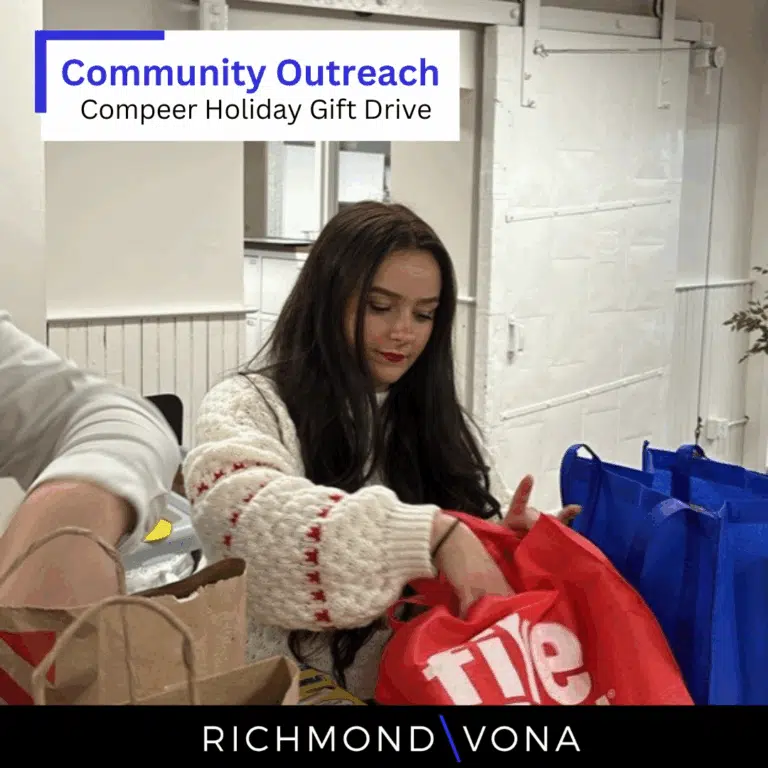 Volunteer packing gifts during Richmond Vona community outreach