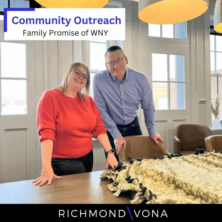 Michael T. Szczygiel and a colleague participating in a community outreach activity