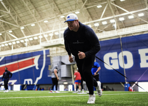 Spencer Brown on Buffalo Bills Stadium Grass doing sprints