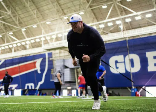 Spencer Brown on Buffalo Bills Stadium Grass doing sprints