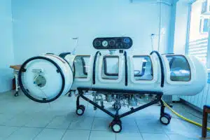Hyperbaric Oxygen Therapy or HBOT chamber tank used for specialised medical treatment for injuries in hospital clinic
