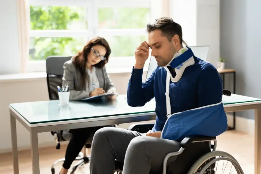 Injured man speaking to a lawyer